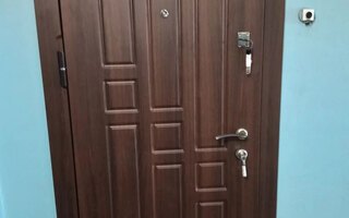 металлическая дверь в квартиру с двусторонней отделкой из МДФ